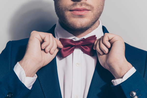 Close,Up,Portrait,-,Bearded,Man,Ties,A,Bowtie,At